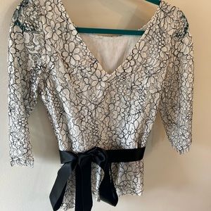 Beautiful elegant top! Size 8 never worn